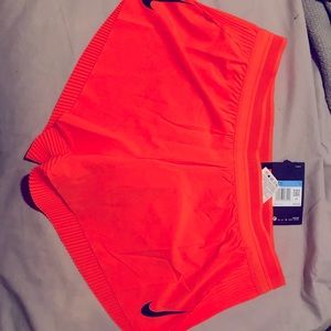 NIKE RUNNING SHORTS SIZE MEDIUM!
